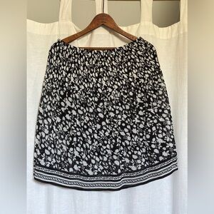 Max Studio Black and White Patterned A-Line Skirt. Sheer fabric and floral print